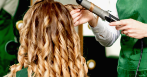 women getting curls on hair at salon